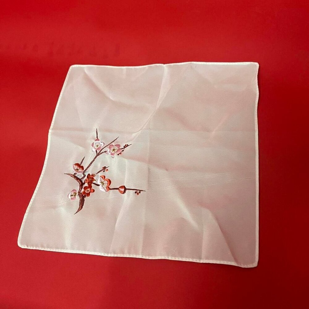 Vintage white handkerchief with florals on the corner​​​